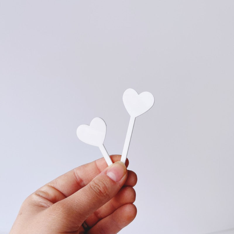 Stecker Herzen Set aus weißem Acryl