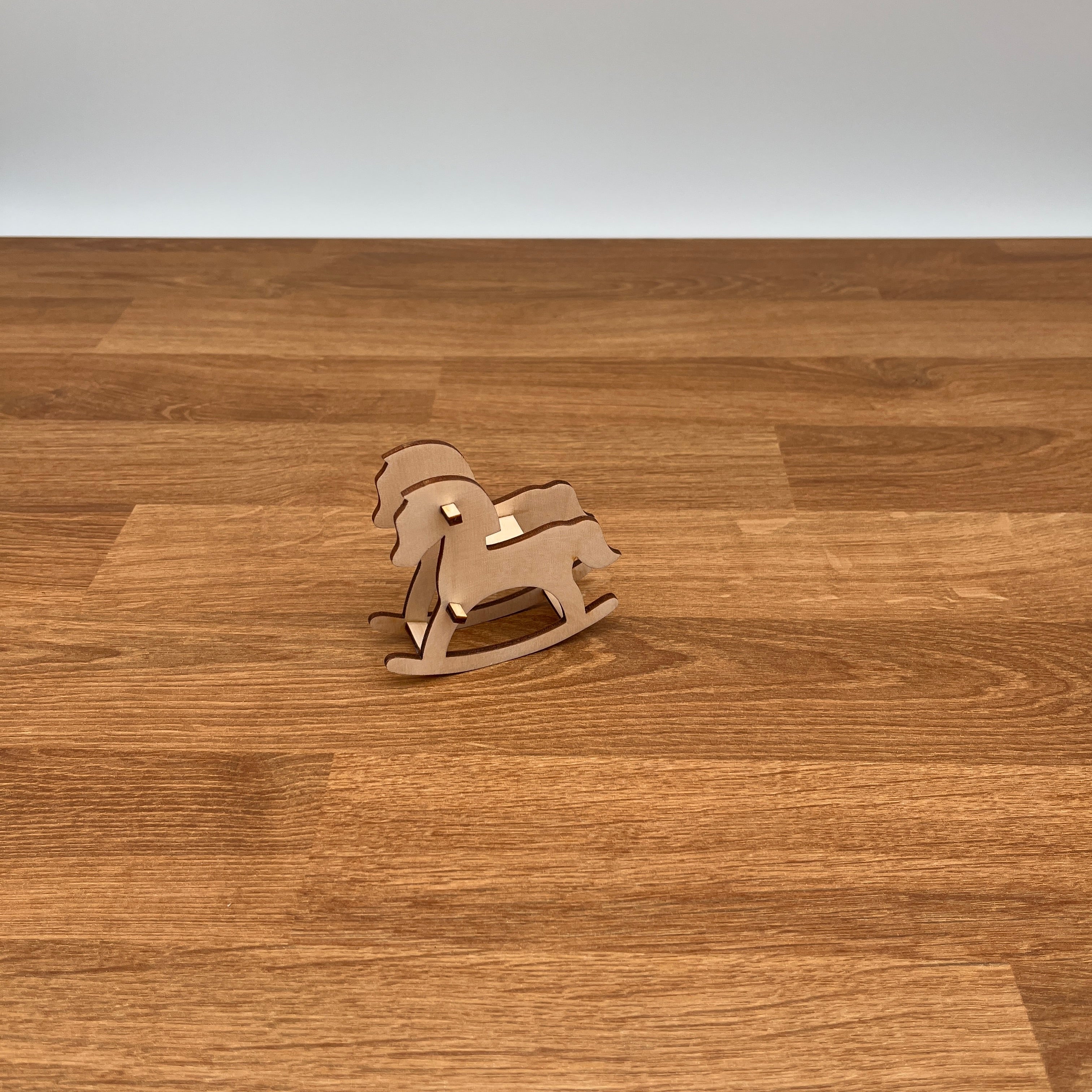 Schaukelpferd Puppenhaus