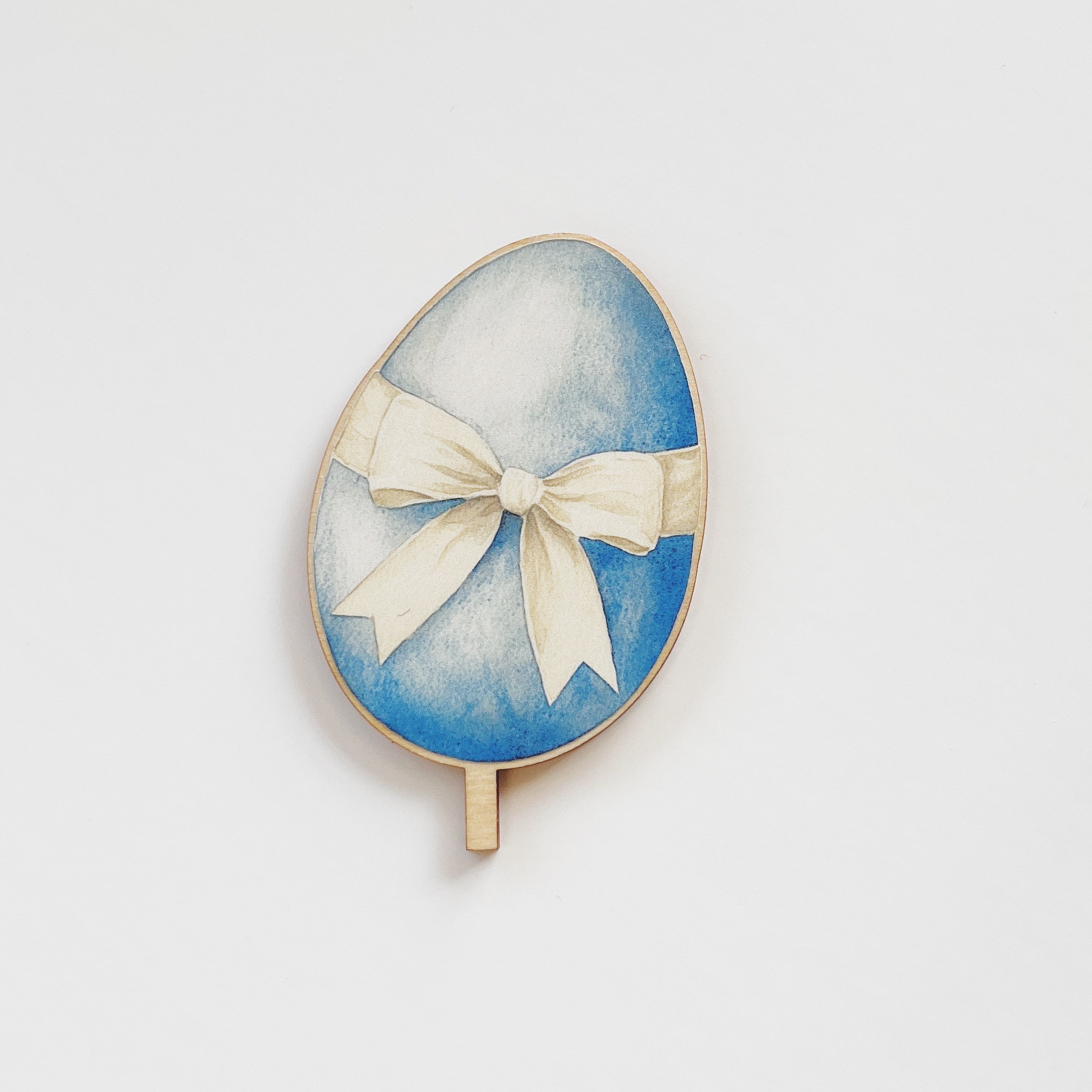 Motivstecker Ei blau mit rosa Schleife