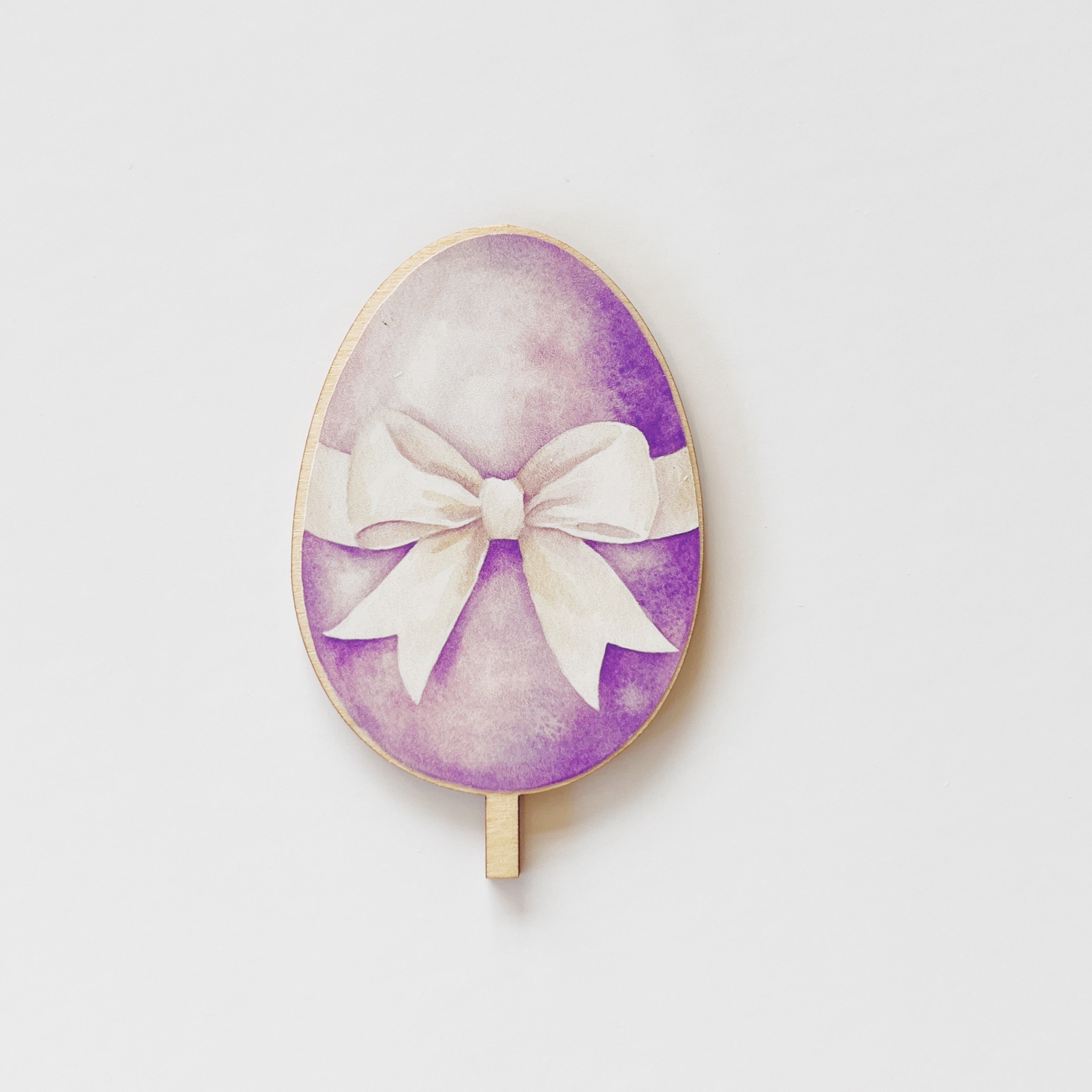 Motivstecker Ei lila mit weißer Schleife