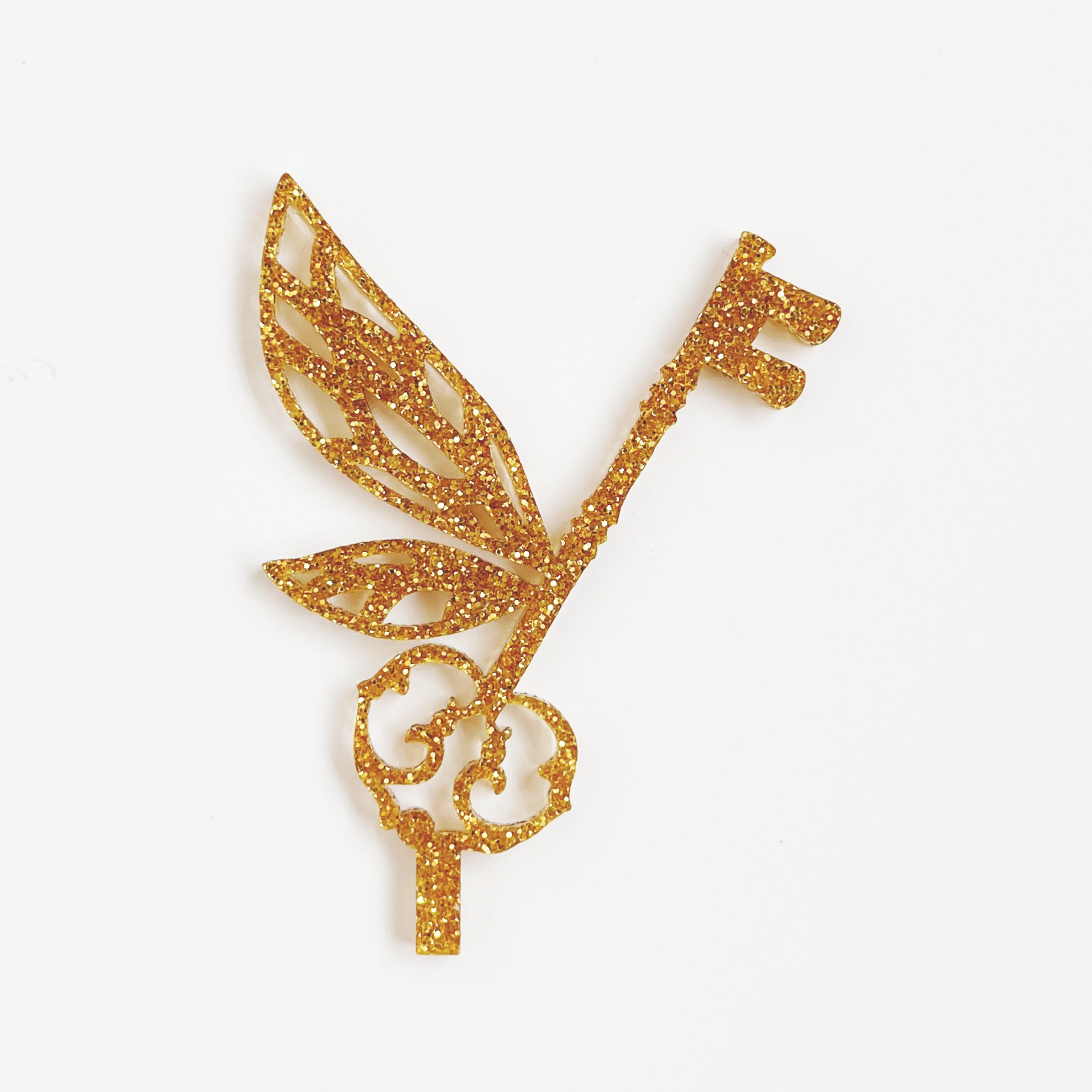 Motivstecker Acryl fliegender Schlüssel Gold Glitzer