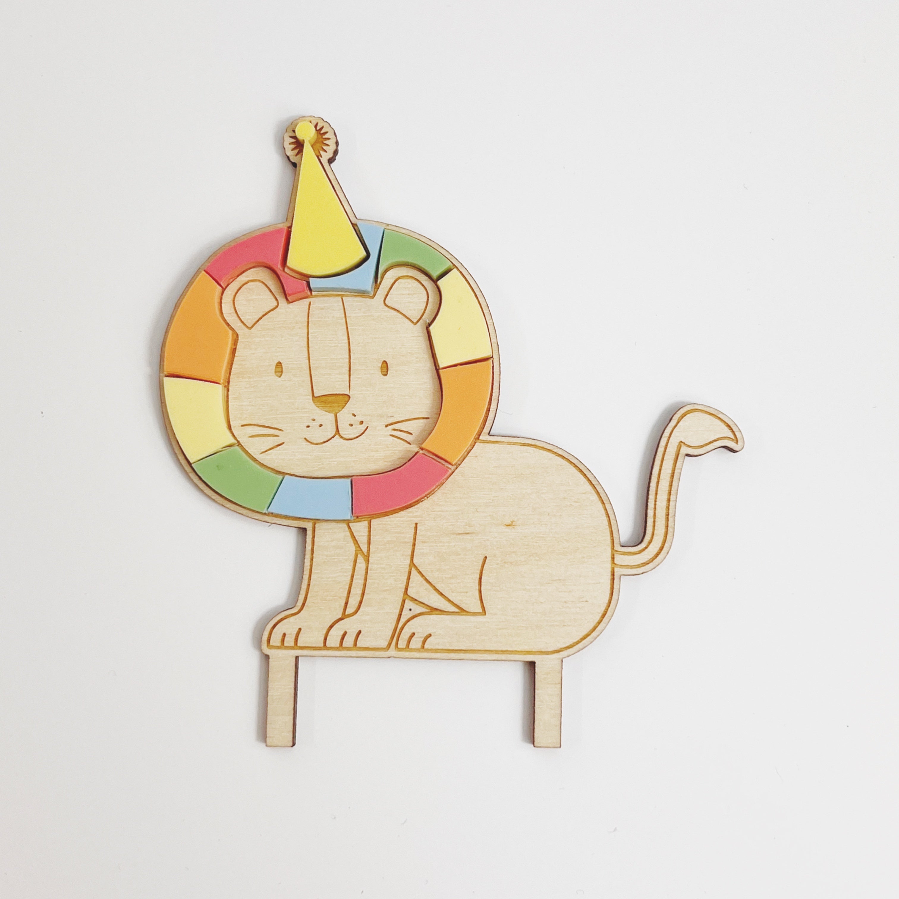 Motivstecker Löwe mit bunter Mähne